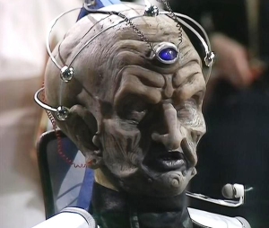 Crippled, mutated, injured? The origin of Davros himself is not explored in this story, it's left to the imagination. All I could think was "how did the actor see what he was doing?"