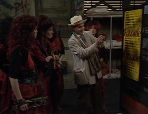 The Doctor shows the 'Kangs' how to use a vending machine. Mmm... fizzade.