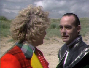 In a part of the matrix that looks like a sand dune, an image of the Valeyard confronts the Doctor.