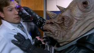The Judoon commander scans the humans for signs of non-humanness.
