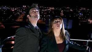 The Doctor and Donna use a precarious lift to escape.